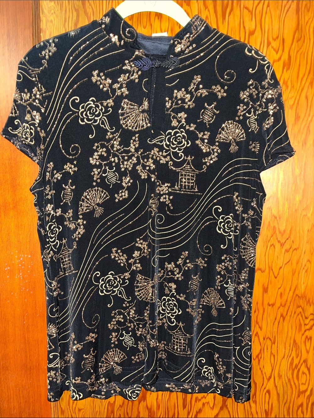 Ronni Nicole Black Top with Gold Floral Accents